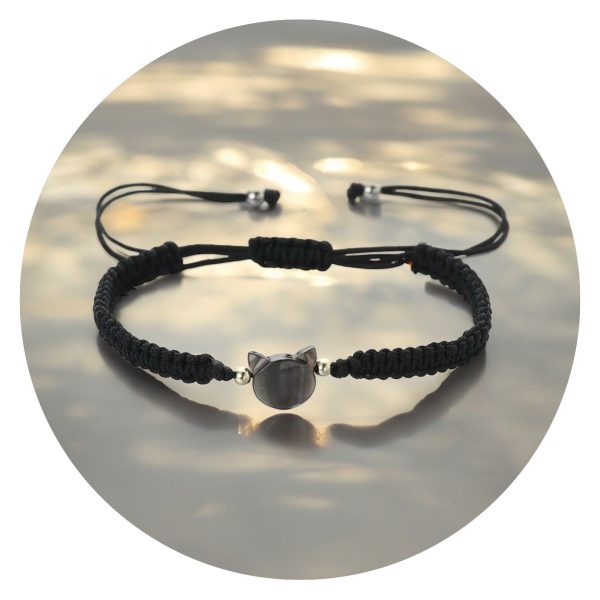 Geknoopt armbandje met kattenkopje wit gemarmerd