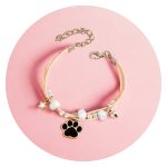 Veterarmband met kraaltje en pootafdruk