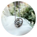 Urnketting hartje in ring met quote