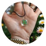 Veterketting met ronde hanger met echt klavertje vier