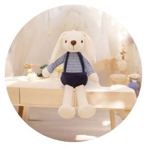 Wit konijn met blauwe broek