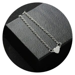 Armbandje met zilverkleurig hartje