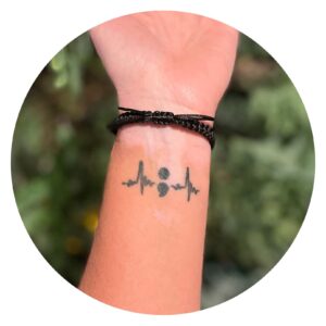 Armband gevlochten met vlinder