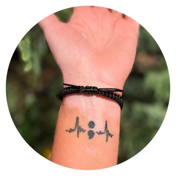 Armband gevlochten met vlinder