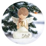 Engeltje geknield met gouden hartje