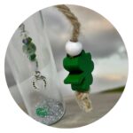 Flesje geluk met klaver en kraal