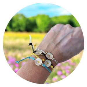 Set vier veterarmbandjes met bloem