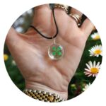 Veterketting met ronde hanger met echt klavertje vier